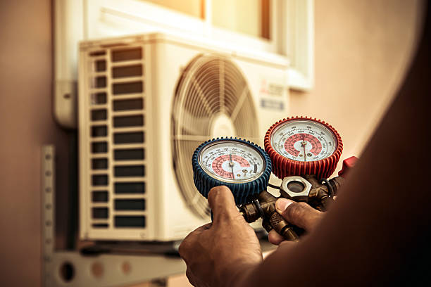 Professional Air Conditioning Service technician working in Saint Louisville, OH